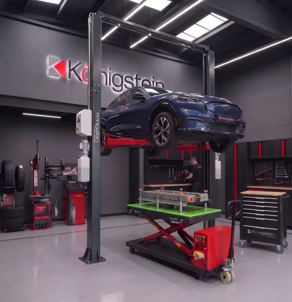 Elevador Königstein con un coche eléctrico y mesa elevadora para baterías
